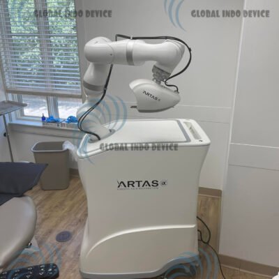 ARTAS iX robotic system performing AI-assisted hair follicle extraction