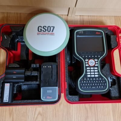Surveyor using Leica GS07 CS20 Survey System for land surveying