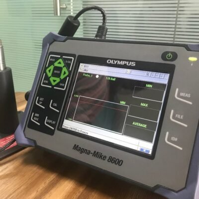 Olympus Magna-Mike 8600 wall thickness gauge inspecting plastic container thickness