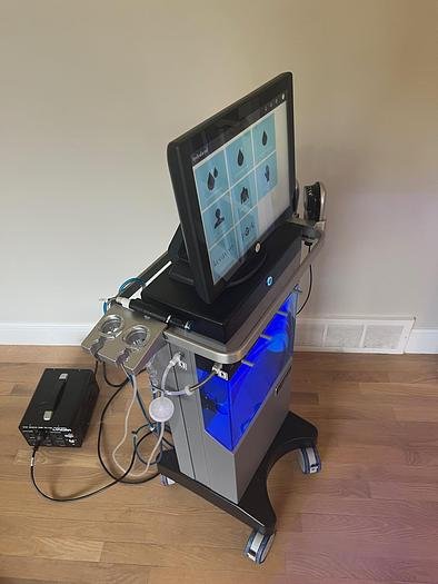 Patient receiving Hydrafacial Elite MD facial rejuvenation procedure