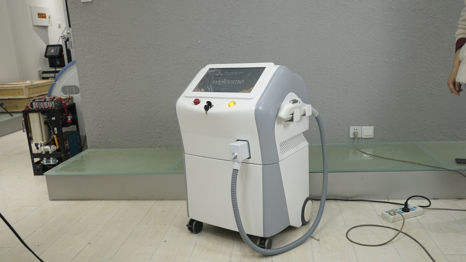 Patient receiving Alma Rejuve IPL facial treatment